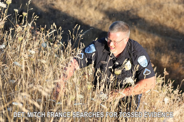 DET. MITCH FRANCE SEARCHES FOR TOSSED EVIDENCE