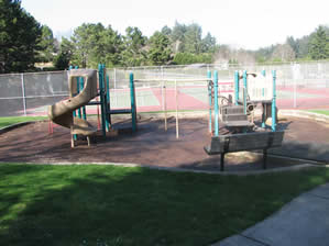 playground with slide and bench